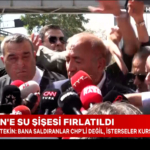 gursel-tekine-konusurken-su-sisesi-firlatildi-hic-sorun-degil-isterlerse-kursun-atsinlar-njk4.jpg